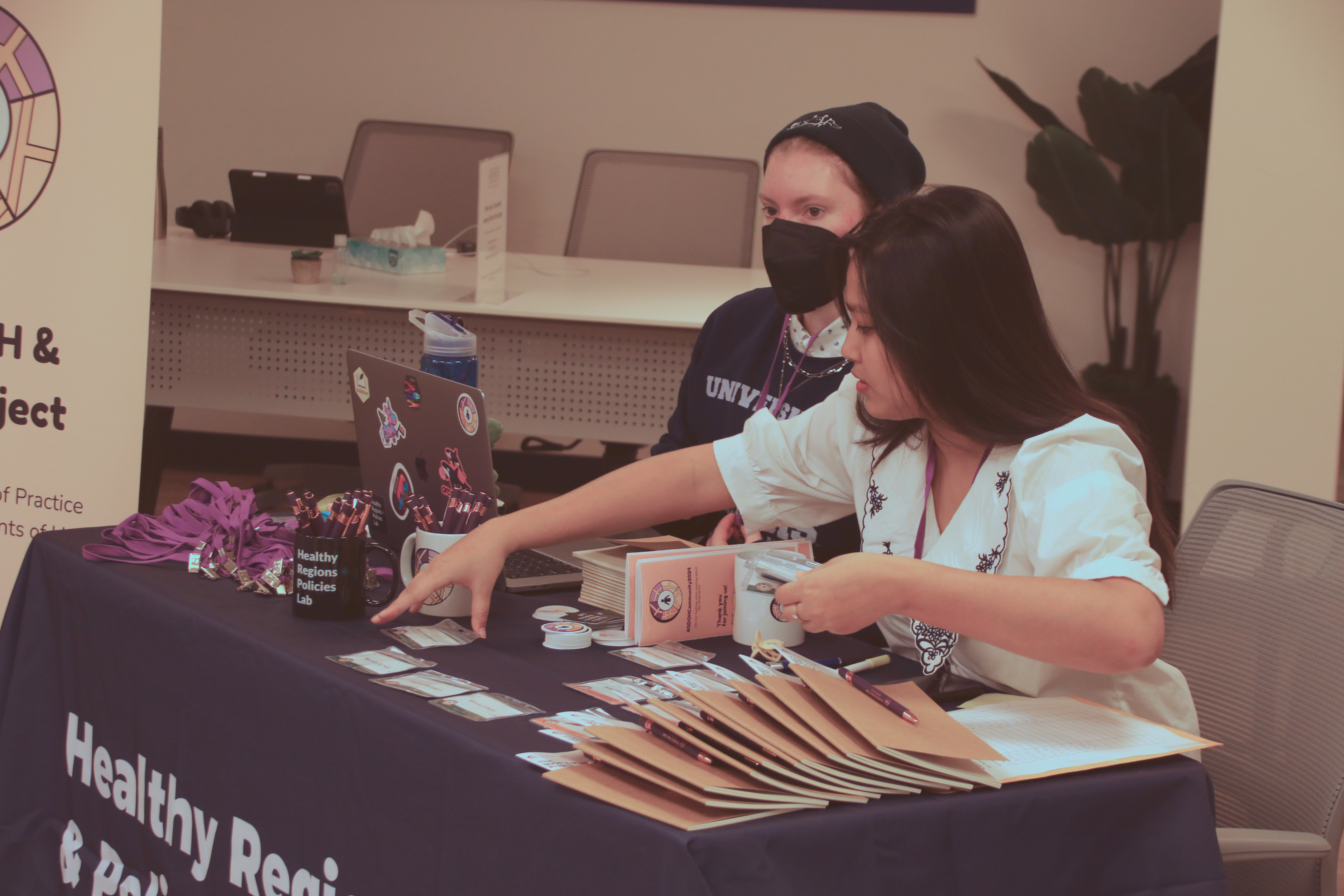 Team setting up welcome table